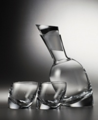 Add a dash of style to your bar with the Tilt decanter set. The unique, slanted design will lend sophistication to all of your entertaining events. Includes two double old-fashioned glasses. Add a dash of style to your bar with the Tilt decanter set. The unique, slanted design will lend sophistication to all of your entertaining events. Includes two double old-fashioned glasses.
