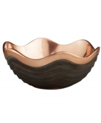 Featuring a bold new look for Nambe's signature metal, the handcrafted Copper Canyon serving bowl captures the beauty of the American Southwest in radiant copper with a rippled green patina. Featuring a bold new look for Nambe's signature metal, the handcrafted Copper Canyon serving bowl captures the beauty of the American Southwest in radiant copper with a rippled green patina.