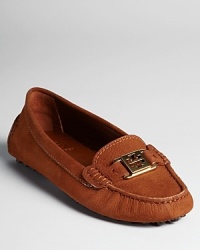 Tory Burch takes her everyday luxe approach into classic driving mocs with signature goldtone logos, in vibrant shades of suede that will step up your warm weather wardrobe. Tory Burch takes her everyday luxe approach into classic driving mocs with signature goldtone logos, in vibrant shades of suede that will step up your warm weather wardrobe.
