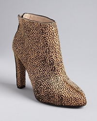 Juicy Couture makes a statement speaking to the exotics trend in these chic leopard booties, designed in luxe calf hair. Juicy Couture makes a statement speaking to the exotics trend in these chic leopard booties, designed in luxe calf hair.