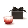 This elegantly scalloped D.L. & Co. candle contains an invigorating fragrance blend of blood orange, red mandarin, grapefruit, sandalwood, and perilla-also known as the rare Japanese shiso, which boosts the immune system. The set features scented oil, a glass diffuser decanter, diffuser reeds and an exquisite black ribboned box for the perfect gift.