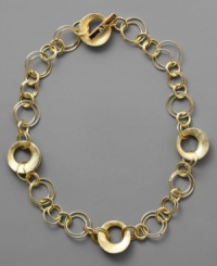 Give your look a touch of fun with this glitzy, goldtone multiple hoop necklace from AK Anne Klein. In mixed metal. Approximate length: 17 inches. Give your look a touch of fun with this glitzy, goldtone multiple hoop necklace from AK Anne Klein. In mixed metal. Approximate length: 17 inches.
