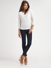 Playful patch pocket sweetens the front of this soft, lengthy essential. BoatneckDropped shouldersSingle front patch pocketThree-quarter sleevesLonger length hits below the hipsViscoseMachine washImportedModel shown is 5'9½ (176cm) wearing US size Small. Playful patch pocket sweetens the front of this soft, lengthy essential. BoatneckDropped shouldersSingle front patch pocketThree-quarter sleevesLonger length hits below the hipsViscoseMachine washImportedModel shown is 5'9½ (176cm) wearing US size Small.