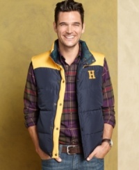 Two vest in one is what you'll get with this reversible vest in contrasting colors by Tommy Hilfiger. Two vest in one is what you'll get with this reversible vest in contrasting colors by Tommy Hilfiger.