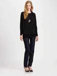 Featuring elegant dolman sleeves, this stretch-jersey top offers the best of both worlds, comfort and style.Round neckDolman sleevesRibbed cuffsPull-on styleRibbed hemAbout 30 from shoulder to hem91% viscose/9% spandexDry cleanImported Model shown is 5'9½ (176cm) wearing US size Small. Featuring elegant dolman sleeves, this stretch-jersey top offers the best of both worlds, comfort and style.Round neckDolman sleevesRibbed cuffsPull-on styleRibbed hemAbout 30 from shoulder to hem91% viscose/9% spandexDry cleanImported Model shown is 5'9½ (176cm) wearing US size Small.