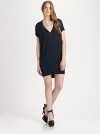 Plunging v-neck, oversized patch pockets and a hi-lo hem enhance this lightweight wool silhouette. V-neckDropped shouldersShort sleevesFront patch pocketsHi-lo hemAbout 18 from natural waistWoolDry cleanImported of Italian fabricModel shown is 5'10 (177cm) wearing US size Small. Plunging v-neck, oversized patch pockets and a hi-lo hem enhance this lightweight wool silhouette. V-neckDropped shouldersShort sleevesFront patch pocketsHi-lo hemAbout 18 from natural waistWoolDry cleanImported of Italian fabricModel shown is 5'10 (177cm) wearing US size Small.