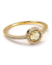 A checkerboard, dome cut center stone with talon prongs is surrounded in sparkling CZ stones on this small-but-statement-making Crislu ring. A checkerboard, dome cut center stone with talon prongs is surrounded in sparkling CZ stones on this small-but-statement-making Crislu ring.