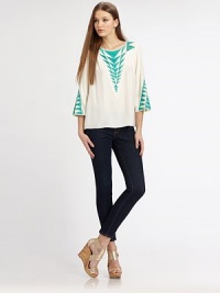 Bold triangle embroidery lends graphic appeal to this flowy silk charmeuse blouse.BoatneckShoulder yokeBell sleevesFlared hemBack box pleatAbout 24 from shoulder to hemSilkDry cleanImportedModel shown is 5'10 (177cm) wearing US size Small. Bold triangle embroidery lends graphic appeal to this flowy silk charmeuse blouse.BoatneckShoulder yokeBell sleevesFlared hemBack box pleatAbout 24 from shoulder to hemSilkDry cleanImportedModel shown is 5'10 (177cm) wearing US size Small.