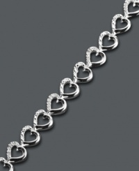 The perfect gift for a special loved one. Victoria Townsend's adorable heart link bracelet highlights sparkling, round-cut diamonds (1/4 ct. t.w.) set in sterling silver. Approximate length: 7 inches. The perfect gift for a special loved one. Victoria Townsend's adorable heart link bracelet highlights sparkling, round-cut diamonds (1/4 ct. t.w.) set in sterling silver. Approximate length: 7 inches.