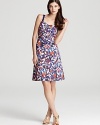 Popping with petals, this silk Tory Burch dress channels the retro-chic with a sweetheart neckline and pleated skirt.