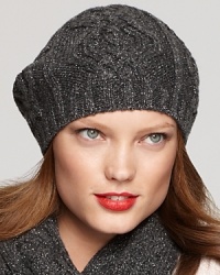 Lauren Ralph Lauren's elegantly crafted beret is woven with metallic silver threads for sparkle that's très chic. Lauren Ralph Lauren's elegantly crafted beret is woven with metallic silver threads for sparkle that's très chic.