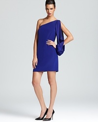 One-shouldered and split-sleeved, Nicole Miller's playful party dress shows off the season's love of jewel tones. One-shouldered and split-sleeved, Nicole Miller's playful party dress shows off the season's love of jewel tones.