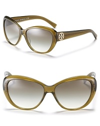 Tory Burch's cat eye sunglasses offer classic styling with rich details that focus on the iconic Tory Burch round logo. Nose tabs help to secure fit.