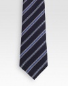 Classic tie woven with diagonal stripes in Italian silk.About 2.8 wideSilkDry cleanMade in Italy