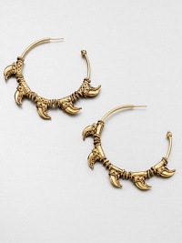 Golden hoops reflect the intricate carvings and tusk-like spikes seen in the ancient city of the Incas.GoldplatedPost backMade in France Golden hoops reflect the intricate carvings and tusk-like spikes seen in the ancient city of the Incas.GoldplatedPost backMade in France