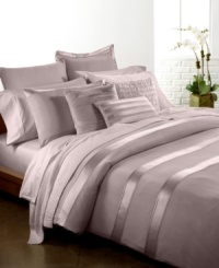 This Essentials Dusk decorative pillow from Donna Karan adds an extra layer of elegance to your bed with layers of soft sateen. Zipper closure. This Essentials Dusk decorative pillow from Donna Karan adds an extra layer of elegance to your bed with layers of soft sateen. Zipper closure.