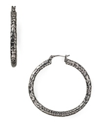 On-trend in textured metal. Slip on this pair of MARC BY MARC JACOBS hoop earrings to tip the style scales. On-trend in textured metal. Slip on this pair of MARC BY MARC JACOBS hoop earrings to tip the style scales.