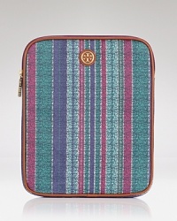 This Tory Burch iPad case works a surf-chic vibe, crafted of coated canvas and detailed with sunny stripes. This Tory Burch iPad case works a surf-chic vibe, crafted of coated canvas and detailed with sunny stripes.