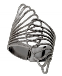 Utterly unique and fiercely in fashion, by GUESS. Hinged claw cuff bracelet crafted from hematite-plated mixed metal. Approximate diameter: 2-1/4 inches.
