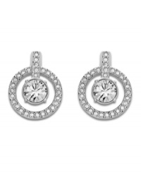 Come full circle: You'll wear Swarovski's double circle crystal stud earrings again and again--whether to dress up a daytime look or enhance your evening attire. Crafted in silver tone mixed metal. Approximate diameter: 1 inch. Come full circle: You'll wear Swarovski's double circle crystal stud earrings again and again--whether to dress up a daytime look or enhance your evening attire. Crafted in silver tone mixed metal. Approximate diameter: 1 inch.