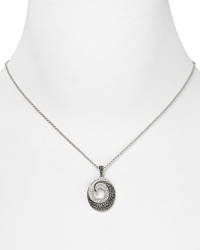 A swirling crystal pendant from Judith Jack lends shapely charm to your accessory collection. Wear this sparkling design to take every outfit from simple to striking. A swirling crystal pendant from Judith Jack lends shapely charm to your accessory collection. Wear this sparkling design to take every outfit from simple to striking.