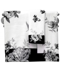 Luminous beauty. This Moonlit Garden hand towel from Lenox brings modern romance to your bath space with sophisticated florals in soft charcoal and black hues. Crafted of pure cotton. Luminous beauty. This Moonlit Garden hand towel from Lenox brings modern romance to your bath space with sophisticated florals in soft charcoal and black hues. Crafted of pure cotton.