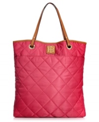 Play up your preppy side with this take-anywhere tote from Tommy Hilfiger. Durable nylon is dressed in a pretty quilted pattern, while signature golden hardware provides the perfect finishing touches. Play up your preppy side with this take-anywhere tote from Tommy Hilfiger. Durable nylon is dressed in a pretty quilted pattern, while signature golden hardware provides the perfect finishing touches.
