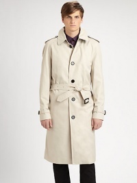 Burberry's classic all-weather essential, impeccably tailored in a single-breasted trench style.Point collarEpaulettesRaglan sleevesBuckle-strap cuffsButton-frontSlash pocketsBack shoulder ventInverted back pleat below waistAbout 44 from shoulder to hem65% polyester/35% cottonFully linedDry cleanMade in Italy Burberry's classic all-weather essential, impeccably tailored in a single-breasted trench style.Point collarEpaulettesRaglan sleevesBuckle-strap cuffsButton-frontSlash pocketsBack shoulder ventInverted back pleat below waistAbout 44 from shoulder to hem65% polyester/35% cottonFully linedDry cleanMade in Italy