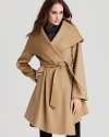 Wrap up in luxe style with this elegant coat from Dawn Levy rendered in a luxe blend of wool and cashmere.