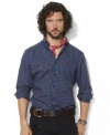 Constructed for a relaxed, comfortable fit in a rustic plaid pattern, a classic sport shirt gets an infusion of luxe from Ralph Lauren's embroidered pony.