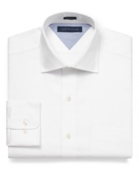 Crisp and classic never fails-just grab this Tommy Hilfiger dress shirt for instantly fresh style. Crisp and classic never fails-just grab this Tommy Hilfiger dress shirt for instantly fresh style.