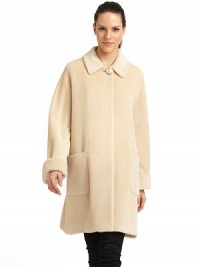 THE LOOKPoint collarButton-front closureLong sleevesDual front patch pocketsBack button tabTHE FITAbout 35 from shoulder to hemTHE MATERIALAlpaca/Lana WoolFully linedCARE & ORIGINDry cleanMade in ItalyModel shown is 5'9 (175cm) wearing US size 4. THE LOOKPoint collarButton-front closureLong sleevesDual front patch pocketsBack button tabTHE FITAbout 35 from shoulder to hemTHE MATERIALAlpaca/Lana WoolFully linedCARE & ORIGINDry cleanMade in ItalyModel shown is 5'9 (175cm) wearing US size 4.