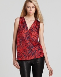 Zebra print takes on vibrant color in this elegantly draped Rachel Zoe top in lustrous silk. Zebra print takes on vibrant color in this elegantly draped Rachel Zoe top in lustrous silk.