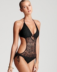The perfect honeymoon swimsuit, this one piece provides a sensual look for a romantic getaway. The perfect honeymoon swimsuit, this one piece provides a sensual look for a romantic getaway.