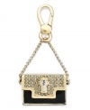 Carry it all with this black and gold charm from Juicy Couture. This limited edition handbag design is embellished with glass pave accents and epoxy detail. Finished with a clasp closure. Crafted in gold tone mixed metal. Approximate drop: 2 inches.