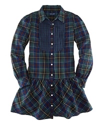 Classically preppy Tartan plaid and a pintucked bib front complete the timeless woven cotton shirtdress. Classically preppy Tartan plaid and a pintucked bib front complete the timeless woven cotton shirtdress.