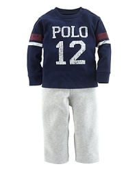A sporty set pairs an essential fleece pant and an athletic cotton jersey tee with a faded graphic print. A sporty set pairs an essential fleece pant and an athletic cotton jersey tee with a faded graphic print.