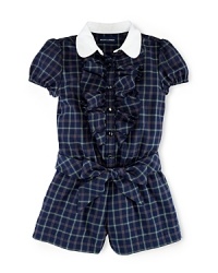 This preppy romper is crafted in classic plaid and features a club collar, a pretty ruffled placket and a matching sash for the perfect collegiate look. This preppy romper is crafted in classic plaid and features a club collar, a pretty ruffled placket and a matching sash for the perfect collegiate look.
