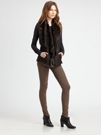 Lush lamb shearling, styled with a sueded body and soft shag lining.Foldover collarSleevelessOpen frontSlash pocketsAbout 20 from shoulder to hemGenuine lamb shearlingDry clean by a fur specialistImportedFur origin: ChinaModel shown is 5'11 (180cm) wearing US size Small. Lush lamb shearling, styled with a sueded body and soft shag lining.Foldover collarSleevelessOpen frontSlash pocketsAbout 20 from shoulder to hemGenuine lamb shearlingDry clean by a fur specialistImportedFur origin: ChinaModel shown is 5'11 (180cm) wearing US size Small.