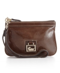 A glossy sheen and timeless sensibility make this a leather wristlet for the sophisticated boho chick.