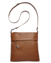 Perfectly portable, this compact crossbody from Tignanello will take you from a Saturday night in the city to a Sunday brunch in the burbs. Soft leather is accented with detail stitching and subtle hardware, while the adjustable strap keeps hands free to access all your essentials. Perfectly portable, this compact crossbody from Tignanello will take you from a Saturday night in the city to a Sunday brunch in the burbs. Soft leather is accented with detail stitching and subtle hardware, while the adjustable strap keeps hands free to access all your essentials.