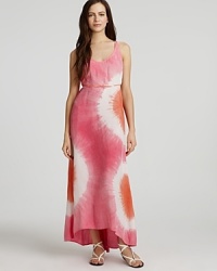 Adopt a cool attitude in C&C California's boho-chic tie dye maxi. The silk, racerback style boasts a tie at waist and asymmetric hem for modern appeal. Adopt a cool attitude in C&C California's boho-chic tie dye maxi. The silk, racerback style boasts a tie at waist and asymmetric hem for modern appeal.