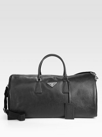 Textured saffiano leather duffel with tessuto nylon lining.Double top handlesAdjustable shoulder strapsZip closureFully lined21W x 10¼H x 9DMade in Italy Textured saffiano leather duffel with tessuto nylon lining.Double top handlesAdjustable shoulder strapsZip closureFully lined21W x 10¼H x 9DMade in Italy