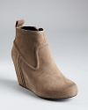 DV Dolce Vita manages to wedge lots of style into a suede bootie, with tonal topstitching and a sleek covered platform.