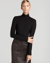 A wardrobe essential, a light-as-air BASLER turtleneck is an effortlessly elegant layering piece.