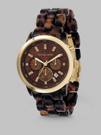 Tortoise shell design adds elegance to a chronograph style with shiny gold IP accents, bringing true luxury just a little bit closer to your wrist. Japanese analog movement Waterproof up to 5 ATM 40mm case with IP (ionic plating) gold elements Chocolate brown mother-of-pearl dial Three chronograph sub dials Round face Stone double indexes Second hand Acrylic tortoise shell bracelet Imported Tortoise shell design adds elegance to a chronograph style with shiny gold IP accents, bringing true luxury just a little bit closer to your wrist. Japanese analog movement Waterproof up to 5 ATM 40mm case with IP (ionic plating) gold elements Chocolate brown mother-of-pearl dial Three chronograph sub dials Round face Stone double indexes Second hand Acrylic tortoise shell bracelet Imported