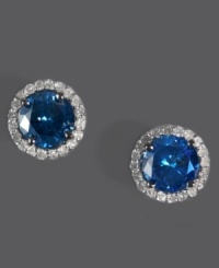 Add a touch of royalty to your look. EFFY Collection's standout stud earrings combine round-cut blue diamond (1-5/8 ct. t.w) with halos of sparkling round-cut white diamonds (1/6 ct. t.w.). Set in 14k white gold. Approximate diameter: 5/16 inch.