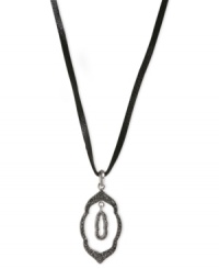 Inner beauty. This leather necklace from Lucky Brand has a pendant crafted from silver-tone mixed metal, with semi-precious lapis and glass accents. Inside the larger version lies a smaller piece for added style. Approximate length: 32 inches. Approximate drop: 2-1/2 inches.