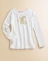 Long-sleeve crewneck with sparkly turtle print on the front, styled with feminine ruffle cuffs. Crewneck Sparkly turtle print Long sleeves with ruffle trim at cuffs Cotton/modal Machine wash Imported