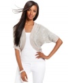 Knit-in sequins make a unique way to sparkle! INC's cocoon cropped cardigan effortlessly tops off all of your summer looks.